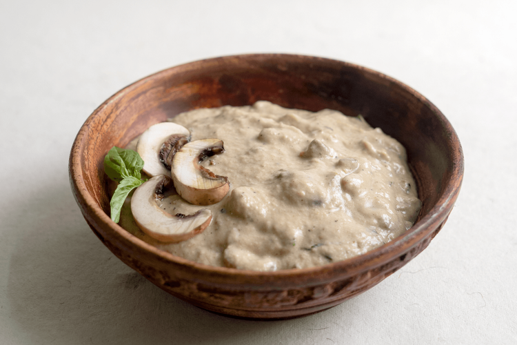Mushroom _ Paneer in creamy Mushroom Sauce with Garlic Bread.png